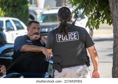 Northridge, California, United States -  June 29, 2022: A Multi-agency Task Force Including LAPD Narcotics Detectives Stages On A Community Street Prior To A Drug  Enforcement Raid Wearing Vests.