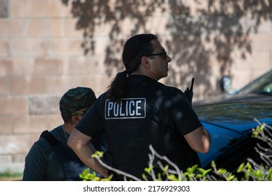 Northridge, California, United States -  June 29, 2022: A Multi-agency Task Force Including LAPD Narcotics Detectives Stages On A Community Street Prior To A Drug  Enforcement Raid Wearing Vests.