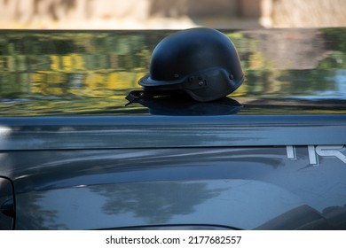 Northridge, California, United States -  June 29, 2022: A Black Tactical Helmet From A Multi-agency Task Force Of LAPD Narcotics Detectives Sits On A Pickup Truck Bed On A Community Street.