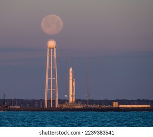 A northrop grumman antares rocket carrying a Cygnus resupply spacecraft during sunrise, soon launching. Digitally enhanced. Elements of this image furnished by NASA.   - Powered by Shutterstock