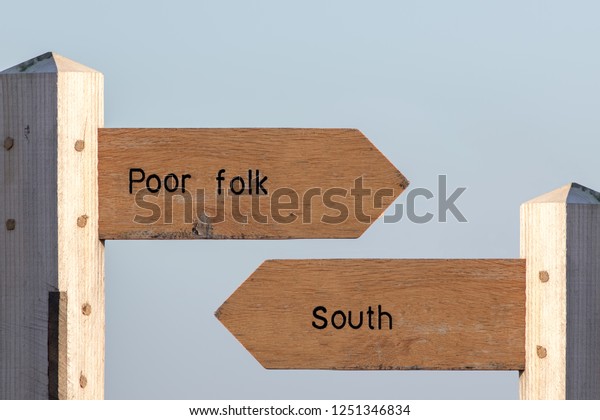 North-south divide. Economic,\
cultural and social division between the North and South UK.\
Standard of living between rich and poor areas. Divided Britain\
signposted.