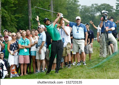 NORTON, MA-SEP 1: Tiger Woods Hits Out Of The Rough During The Third Round At The Deutsche Bank Championship At TPC Boston On September 1, 2013 In Norton, Massachusetts. 