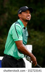 NORTON, MA-SEP 1: Tiger Woods watches his tee shot off the fourth hole during the third round at the Deutsche Bank Championship at TPC Boston on September 1, 2013 in Norton, Massachusetts. 