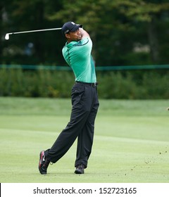 NORTON, MA-SEP 1: Tiger Woods Hits A Fairway Shot During The Third Round At The Deutsche Bank Championship At TPC Boston On September 1, 2013 In Norton, Massachusetts. 