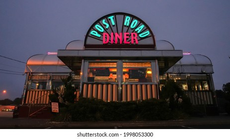 NORWALK, CT, USA - JUNE 25, 2021:  Post Road Diner sigh with lights on early morning