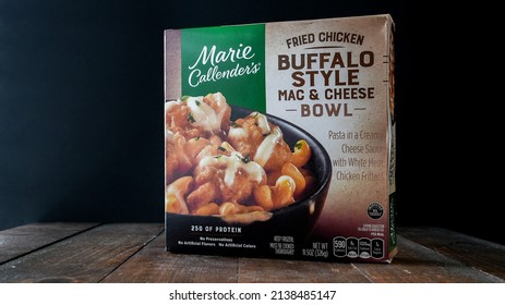 NORWALK, CT, USA - MARCH 23, 2022: Buffalo Style Mac And Cheese Paper Box From Marie Callenders On Wooden Table Near Window