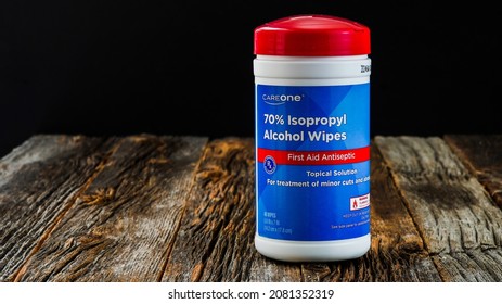 NORWALK, CT, USA -  NOVEMBER 24, 2021: 70% Isopropyl Alcohol Wipes Plastic Package On Wooden Boards