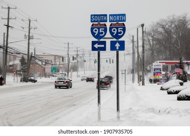 NORWALk, CT, USA-FEBRUARY 1, 2021:  Traffic sign for Interstate 95 on Connecticut Avenue during winter snow storm  day