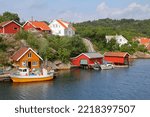 Norway fishing village harbor in Skjernoy island in the region of Vest-Agder. Southern Norway.