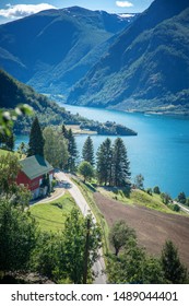 Norway fjord shore, Aurland fjord, beautiful Scandinavian landscape, travel to Norway, summer, vertical shot