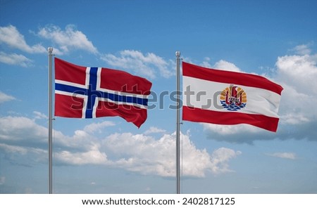 Norway and French Polynesia flags waving together on blue cloudy sky, two country relationship concept