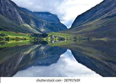 Norway - Ideal Fjord Reflection In Clear Water