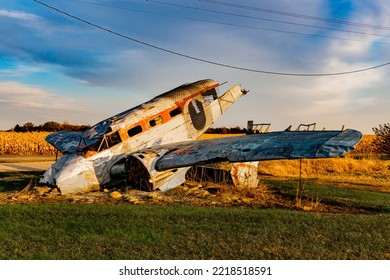 Norway, Illinois, United States - October 23, 2022: Agricultural Crash Monument: Beechcraft 18, A Small, Two-prop Passenger Plane, Burrowed Nose Down Into The Ground, A Partly Smashed And Gutted Hulk.