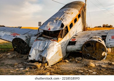 Norway, Illinois, United States - October 23, 2022: Agricultural Crash Monument: Beechcraft 18, A Small, Two-prop Passenger Plane, Burrowed Nose Down Into The Ground, A Partly Smashed And Gutted Hulk.