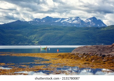 Norway. Landscape With Fjord, Boat And Mountains On A Summer Day