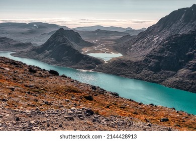Norway trekking on mountains - Besseggen trail. View on Gjende Lake nad Øvre Leirungen.