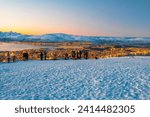 Norway - Troms og Finnmark- Tromso - The tourists take pictures in winter from the Fjellheisen mountain at sunset