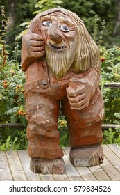 Norwegian Carved Wooden Troll. Scandinavian Folklore. Norway. Vertical