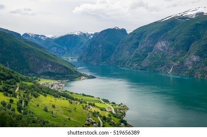 Norwegian Fjord At Cloudy Day Aerial View. Aurlandsvangen Town, Sognefjord, Norway.