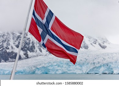 Norwegian Flag And View To Liefdefjorden, Haakon VII Land, Spitsbergen, Svalbard, Norway, Europe