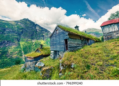 Norwegian typical grass roof wooden old house. Colorful morning scene in Norway, Europe. Beauty of countryside concept background. Instagram filter toned.