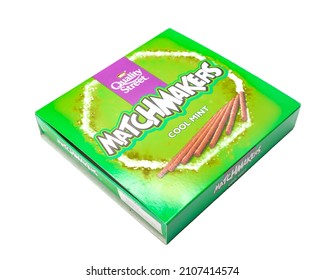 Norwich, Norfolk, UK – January 2022. A box of Quality Street cool mint Matchmakers chocolates cut out isolated on a plain white background