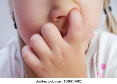 Nose Picking. Child Picking His Nose Close Up