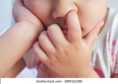 Nose Picking. Child Picking His Nose Close Up