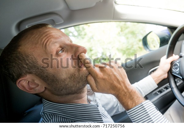 Nose
picking while driving, funny transportation
concepts