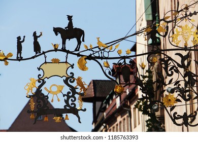 Nostalgia shop sign of medieval.  Beautiful View Of Historical Nuremberg City At Sunny Day. Historic Highlights of Germany. Nuremberg is the birthplace of Albrecht Duerer and Johann Pachelbel. 
