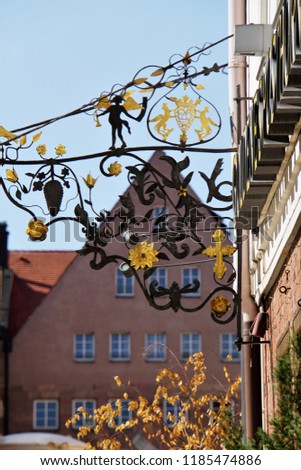 Nostalgia shop sign of medieval.  Beautiful View Of Historical Nuremberg City At Sunny Day. Historic Highlights of Germany. Nuremberg is the birthplace of Albrecht Duerer and Johann Pachelbel. 