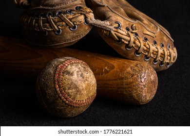 Nostalgic Baseball Gear From A Childhood Of Many Neighborhood Games. Baseball, Glove And Bat All Scratched And Stained From Years Of Play