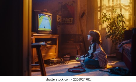 Nostalgic Retro Childhood Concept. Young Girl Watches A Tennis Match On TV In Her Room With Dated Interior. Supporting Her Favorite Player, Getting Excited While Watching An Important Game.