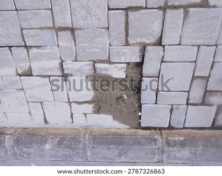 Not everything has to be perfect. Broken pavers, missing pieces, wet sand. Even the sidewalk has bad days. Beauty in the broken, stories in the cracks.