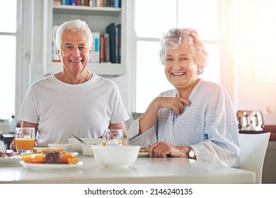 Its not just about sharing breakfast - its about sharing love. Portrait of a senior couple having breakfast together at home. - Powered by Shutterstock