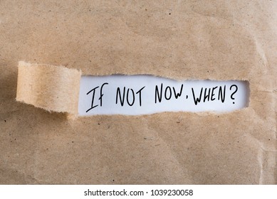 If Not Now When, appearing behind torn brown paper