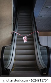 Not Working Escalator In Office Building. Pass Is Closed. There Is No Access. The Area Is Closed. No Entry.