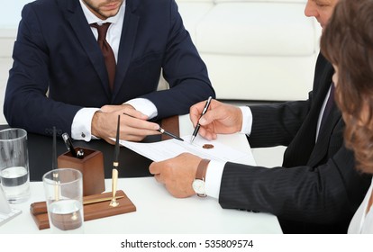 Notary With Client In Office