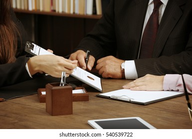 Notary With Client In Office