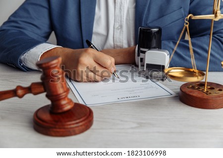 Notary man working at office. Notary public tools