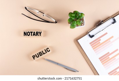 NOTARY PUBLIC Text On A Wooden Block With Chart And Glasses, Business Concept