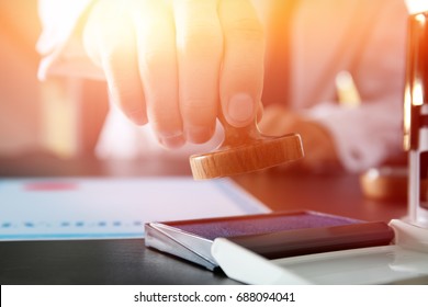 Notary Public With Wooden Stamp, Closeup