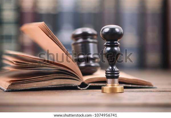 Notary seal , Judge Gavel, Notarized document\
concept, Legality\
concept.