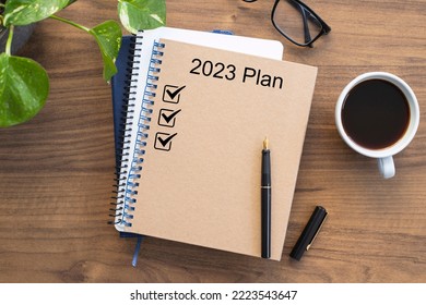 Note book with 2023 goals text on it to apply new year resolutions and plan. - Shutterstock ID 2223543647