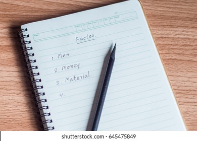 Note book for work on the table.