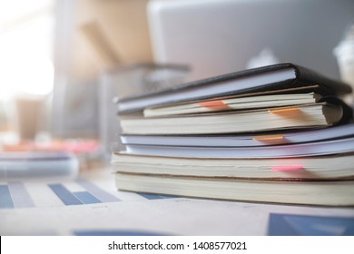 Note books on work desk at office. - Shutterstock ID 1408577021