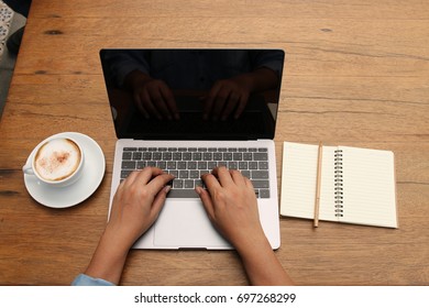 note computer cup coffee hand