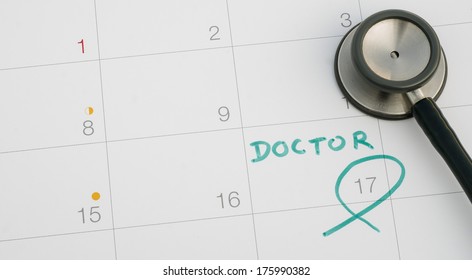 A Note Of A Doctor Appointment On A Calendar