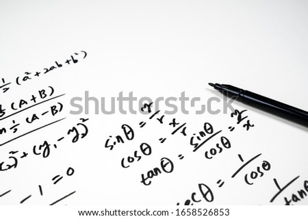A note full of mathematical formulas. Education concept.