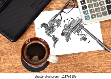 Note map world on table businessman